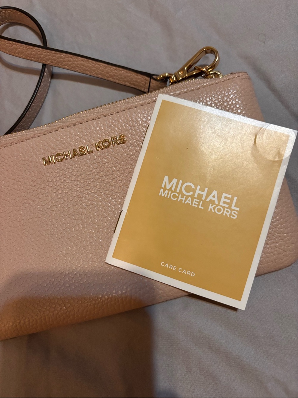 Michael Kors Blush Pink Pebbled Leather Wristlet with Gold Hardware